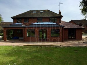 Brick Orangery with Roof Lanterns and Carport