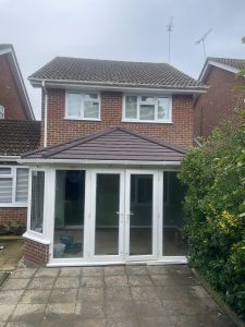 Conservatory with Solid Tiled Roof and French Doors