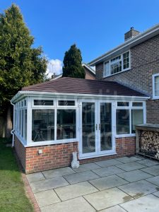 Edwardian Conservatory with Solid Tiled Roof and Decorative Glass