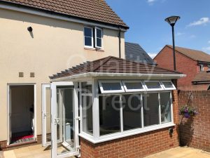 Orangery with Solid Tiled Roof and French Doors